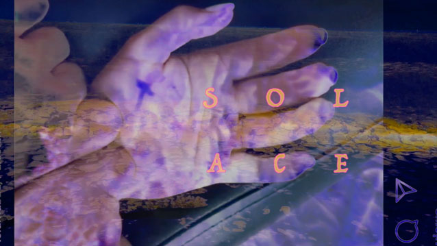 A moving image still of a hand with layers of translucent colours and text over the hand