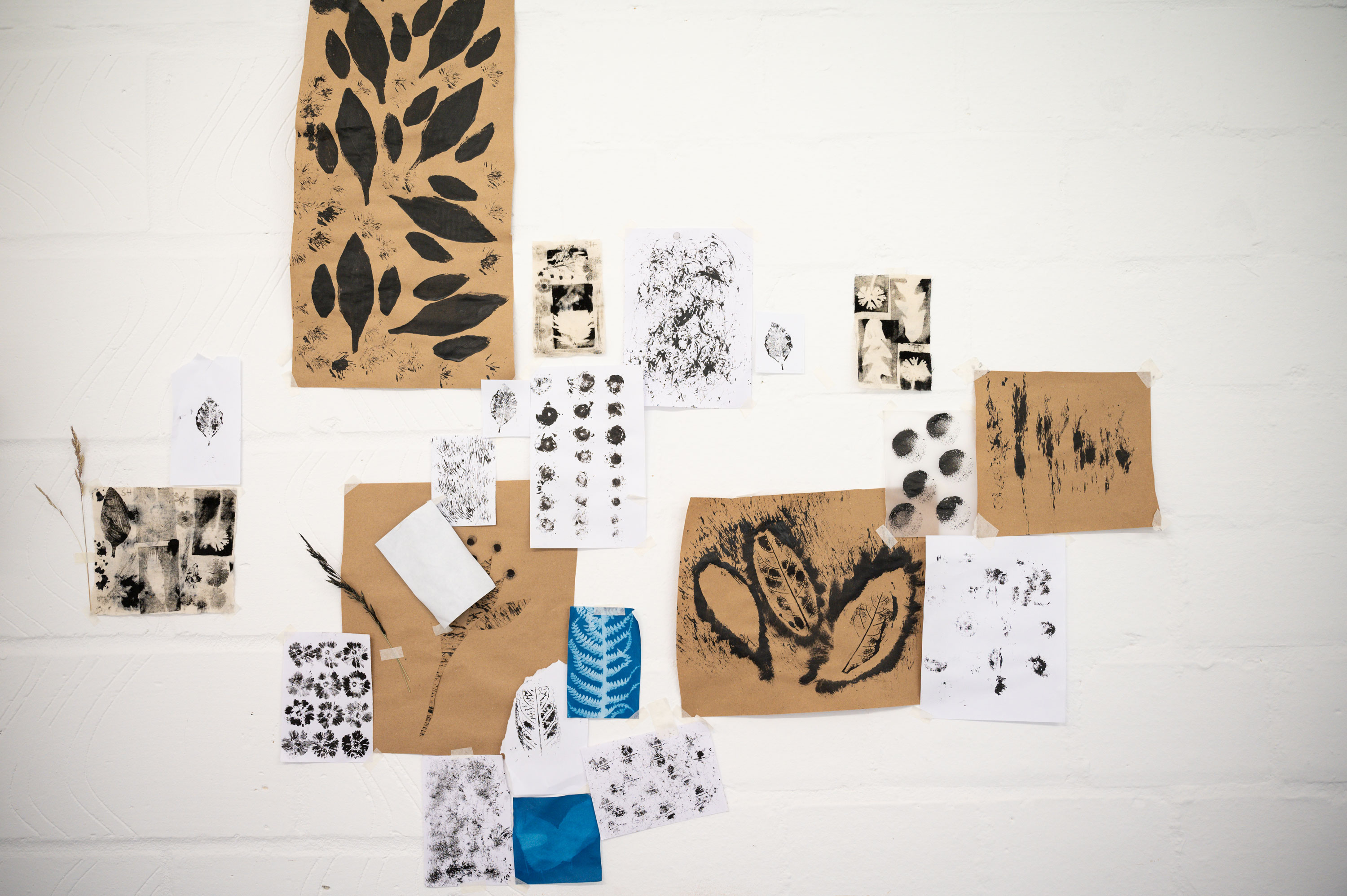 Examples of Ink prints on white and brown paper
